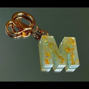 M keychain with latch